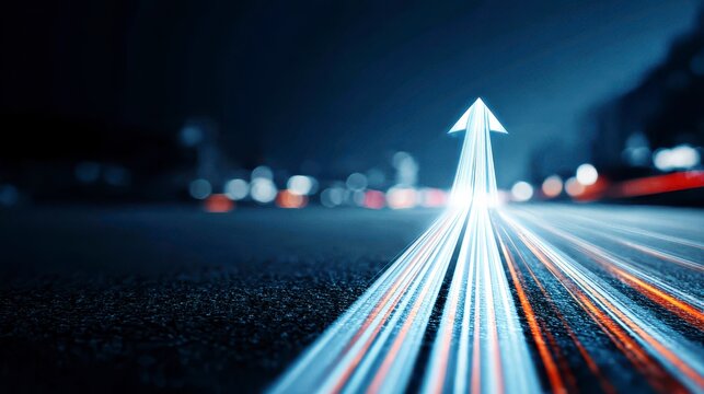 Growth trajectory concept illustrated by glowing arrow light trails on dark road at night, symbolizing progress, speed, and futuristic technology in urban environment