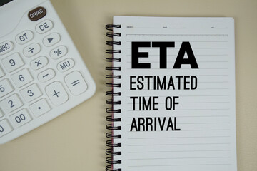 ETA Abbreviations of Estimated Time Of Arrival text with calculator phrase of business and financial concept