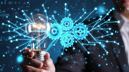 Hand holding glowing light bulb connected to digital gears and network of blue lights, symbolizing innovation and technology integration, 4k high quality - Powered by Adobe