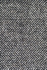 Black and white colored wool fabric background
