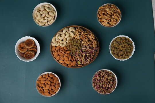 Healthy mixed dry fruits assortment featuring a nutritious blend of almonds, cashews, pistachios, walnuts, raisins, and dates. Rich in natural energy, vitamins, and minerals, this dry fruit mix is wid