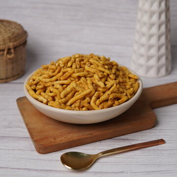 Authentic Ratlami sev, a famous Indian namkeen from Ratlam, made using chickpea (besan) flour and flavored with clove, black pepper, and aromatic spices. Known for its bold, spicy taste and crunchy te