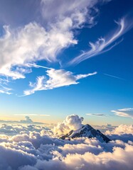 Majestic Mountain Peak Emerging from Clouds at Sunrise