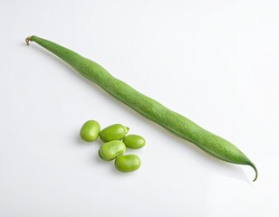 Green bean pod and detached beans on white reflective surface