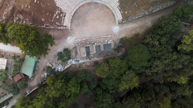 Geometric Top-Down Aerial Drone Shot of the Historic Ancient Theater Archaeological Site in Limenas, Thasos Island, Greece.
