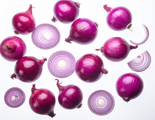 Overhead shot of red onions, whole, sliced, and individual segments on white