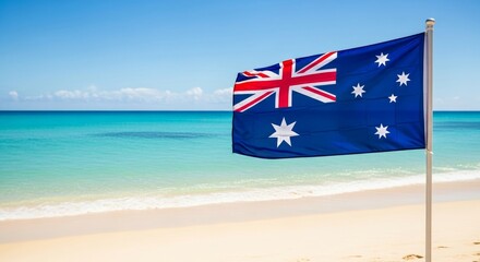 Vibrant Australian flag waving proudly on a pristine tropical beach with turquoise ocean, ideal for an Australia Day celebration concept.