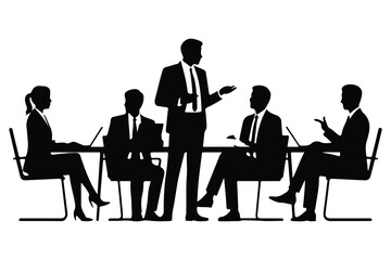 Five people in business suits sitting around a conference table with one standing