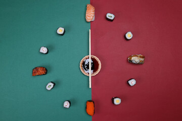 sushi chopsticks hour minutes hand mini sauce bowl rotating on green red paper clock watch time