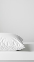 Soft white pillow resting on a pure white surface, suggesting ultimate comfort, deep sleep, relaxation, hygiene, and luxurious bedding ,bedding, hygiene, fabric