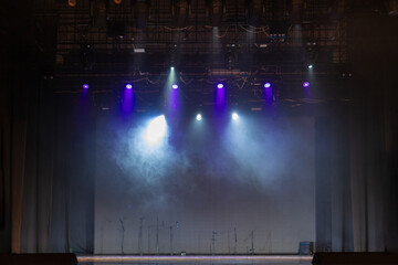 scene, stage light with colored spotlights and smoke