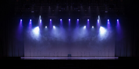 Theatrical scene without actors, scenic light and smoke