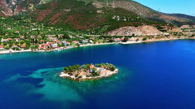Agios Nikolaos islet on the Delphi Riviera, Greece