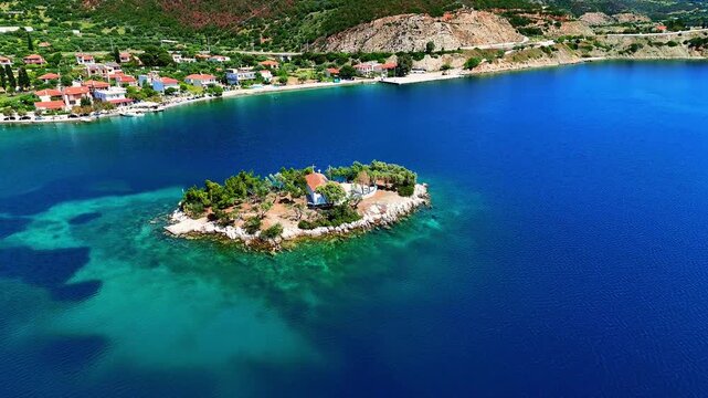 Agios Nikolaos islet on the Delphi Riviera, Greece