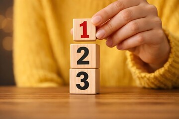 Wooden cubes with numbers first, second, and third. Task priority and management concept. The order of priority in any activity. Set work priority.