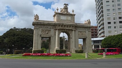 Valencia, Spain - 29 April 2025- view of  the Porta de la Mar ( Gateway to the Sea ) one of Valencia 's most emblematic monuments  located in a large roundabout in the city center 