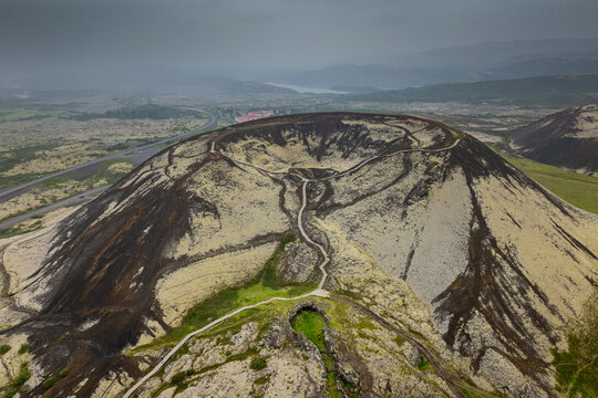drone point of view of the Grabrok volcanic crater in northwestern Icleand