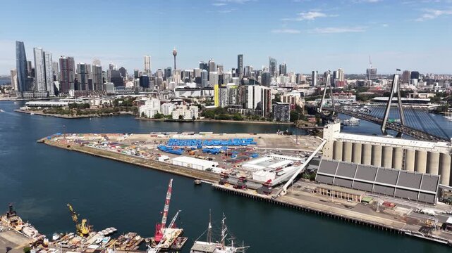 Five Docks wharf pier warehouse silo cargo cranes and ships waterfront in Sydney.