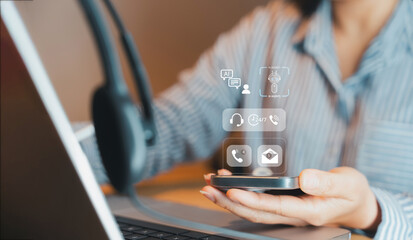 Online customer service,AI virtual assistant,Support agent using smartphone and laptop with digital interface icon for customer support,chatbot technology, modern business communication service