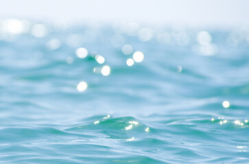 Lights on sea background. Waves.