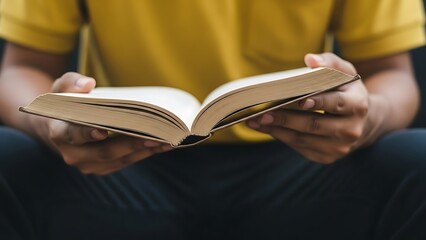 Reading Book in Yellow Shirt
