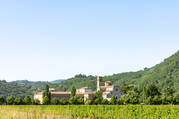 View of Benedictine monastery and convent Abbazia di Praglia in Padua, Italy as a Christianity, religion, and Catholicism concept with green summer landscape 