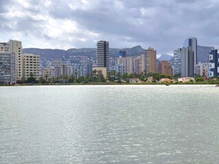 Calm urban waterfront skyline for corporate and transport