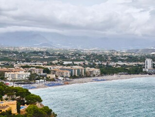 Seaside area exhibiting leisure facilities amid natural landscape