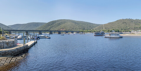 leisure harbor at river outlet and Garden Route road bridge over Kerobooms river , Plettenberg bay, South Africa