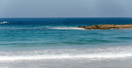 cliffs and Ocean waves at Central Beach,  Plettenberg, South Africa
