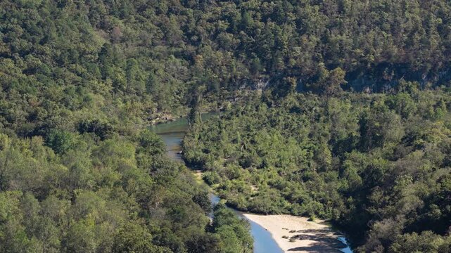 Lush Vegetation With Flowing Narrow River In Devils Backbone Wilderness Of The Mark Twain National Forest In Missouri, USA. Aerial Shot