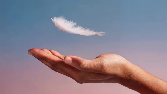 Gentle white feather resting on open hand against pastel sky symbolizing softness protection freedom and spiritual lightness in dreamy inspirational scene