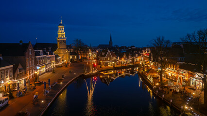 Fototapeta premium Aerial from christmas in the city Lemmer in the Netherlands 