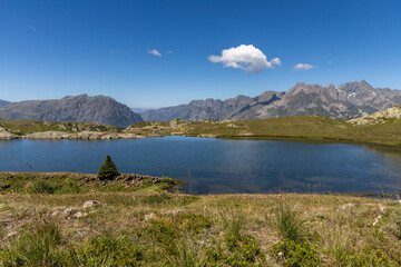 Scenic Lake Besson in the French Alps, located northeast of Alpe d&rsquo;Huez in the Grandes Rousses massif