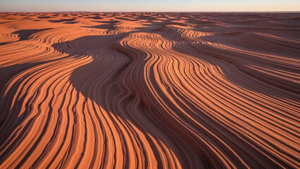 Smooth sandstone ripples in terracotta and peach tones