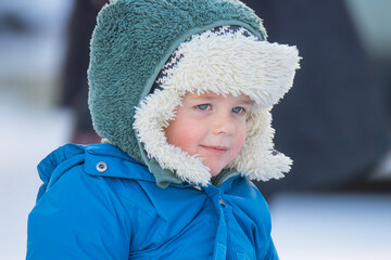 Little Boy Bundled Up in Layers on a Cold Day