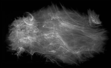 Wisps of white smoke isolated on a black background with space for text