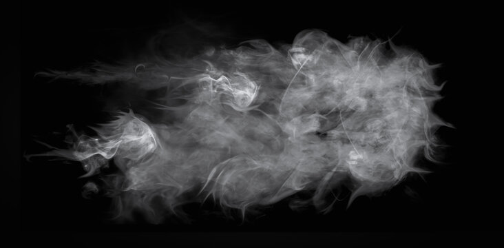 Wisps of white smoke isolated on a black background with space for text - Powered by Adobe