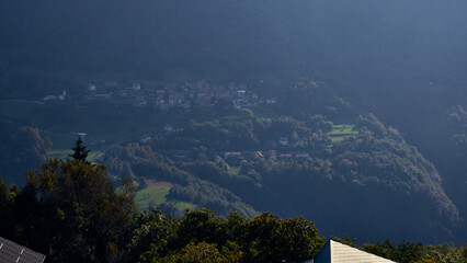Verdant Valley and Mountain Peaks in Lombardy