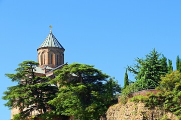 Metekhi Temple is a church dedicated to the Dormition of the Blessed Virgin Mary in Tbilisi.