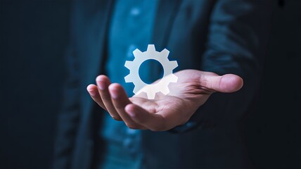 Digital technology gear symbol in human hand innovation concept