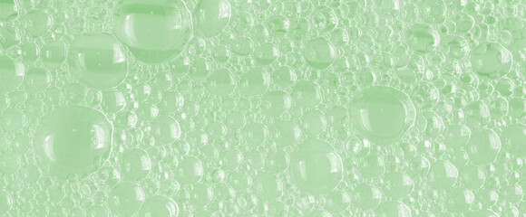 Bubbles of body gel or shampoo or shaving gel. Closeup.