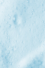 The texture of detergent foam or shampoo or shaving gel.