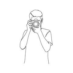 a person holding a camera and taking a photo