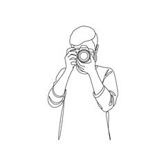 a person holding a camera and taking a photo