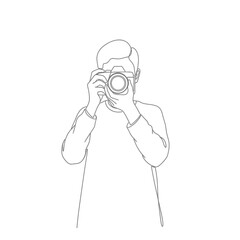 a person holding a camera and taking a photo