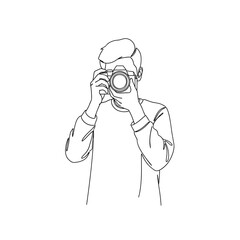 a person holding a camera and taking a photo