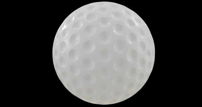 Seamless looping Britain golf ball with hexagonal dimples isolated horizontal axis rotation footage with alpha channel (Prores, 4K).  Studio light. 3D FX animation.

