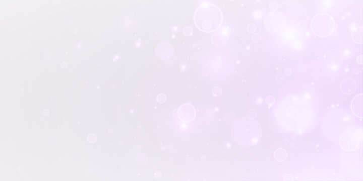 Glistering particles and sparkling confetti on a purple festive background.