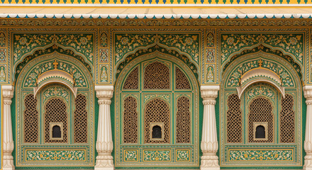 Obraz premium The ornate facade of an Indian haveli (mansion) with intricate lattice work and colorful frescoes.